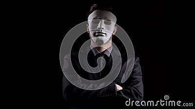 Anonymous man in business suit folding hands, masking personality, hiding income Stock Photo