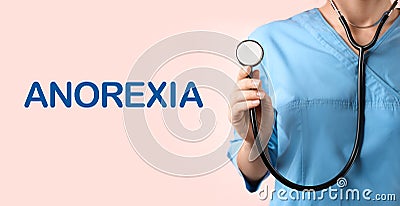 Anorexia concept. Doctor with stethoscope on pink background, closeup Stock Photo