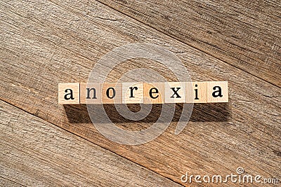 Anorexia word on wooden block Stock Photo
