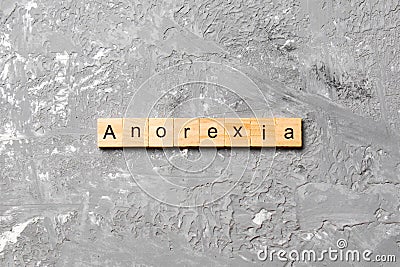 Anorexia word written on wood block. anorexia text on table, concept Stock Photo