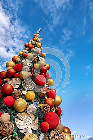 Ant view image of Christmas tree decorated with holiday spirit in portrait orientation. Stock Photo