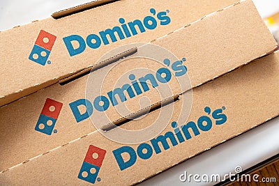 Antalya, Turkey - September 10, 2021: Domino`s Pizza logo detail on a recycled pizza box Editorial Stock Photo