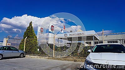 Antalya, Turkey - September 17, 2022: Fiat Automobiles company logo on a dealership building. Italian car manufacturer Editorial Stock Photo