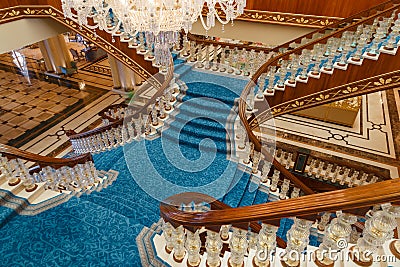 ANTALYA, TURKEY - SEPTEMBER 12, 2019: Main staircase in lobby of Titanic Mardan Palace luxury hotel, the most expensive European` Editorial Stock Photo