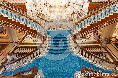 ANTALYA, TURKEY - SEPTEMBER 12, 2019: Main staircase in lobby of Titanic Mardan Palace luxury hotel, the most expensive European` Editorial Stock Photo