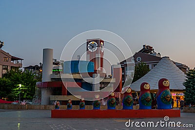 ANTALYA, TURKEY: A square with a clock tower, a fountain and a monument in the form of a matryoshka doll in Antalya. Editorial Stock Photo