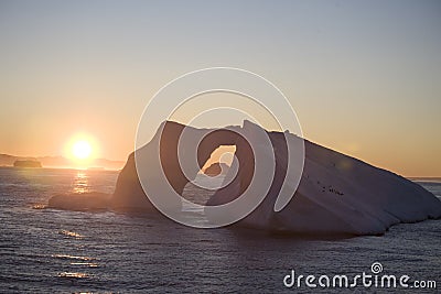 Antarctic iceberg at sunset Stock Photo