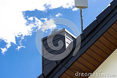 Antenna amplifier for home mobile Internet and a TV receiver mounted on the chimney. Stock Photo