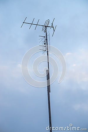 Antenna analog on the mast for receiving a radio signal Stock Photo