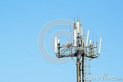 Antenna cellular networks against the blue clear sky Stock Photo