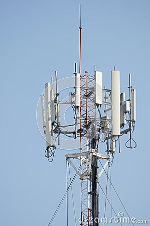 Antenna cellular signal mobile phone tower in blue sky Stock Photo