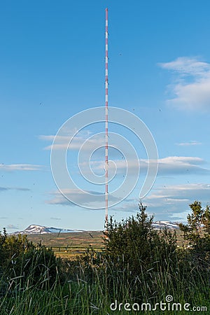 Antenna mast in vilalge of Eidar in Iceland Stock Photo