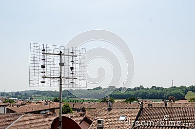 Antenna with parabola, on the roofs that transmits on various frequencies. Stock Photo