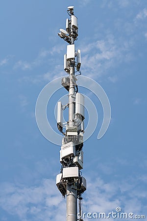 Antenna tower building. Technology Cellular Station, Wireless Communication Transmitter on Outdoor Poles Power , micro system 4G, Stock Photo