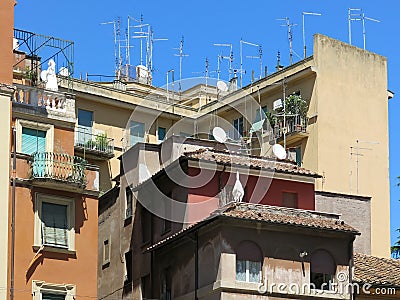 Antennas and satellite dishes on rooftop, Rome Editorial Stock Photo