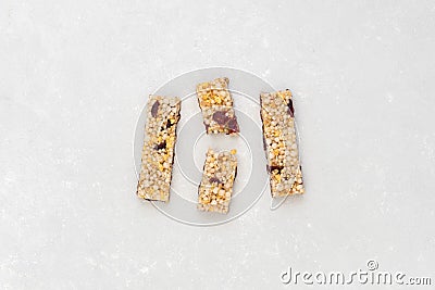 Anti-age snacking, healthy food. Snak products with anti-aging ingridients. Whole-cereal fitness bar Stock Photo