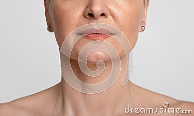 Anti-Aging Skincare. Cropped portrait of middle-aged woman with beautiful skin Stock Photo