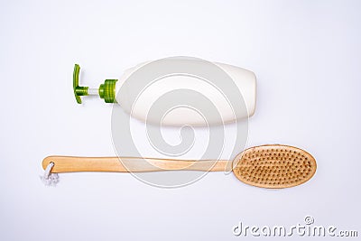 Anti-cellulite products for the prevention and treatment of cellulite and for body massage, wooden brush a bottle of lotion on Stock Photo