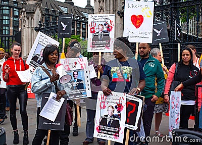 Anti knife crime campaigners from Operation Shutdown protesting outside the gates of Parliament Editorial Stock Photo