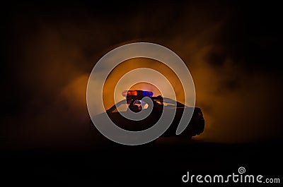 Anti-riot police give signal to be ready. Government power concept. Police in action. Smoke on a dark background with lights. Blue Stock Photo