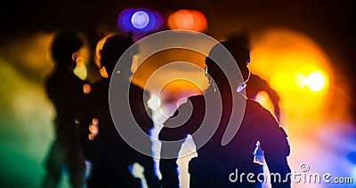 Anti-riot police give signal to be ready. Government power concept. Police in action. Smoke on a dark background with lights. Blue Stock Photo