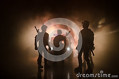 Anti-riot police give signal to be ready. Government power concept. Police in action. Smoke on a dark background with lights. Blue Stock Photo