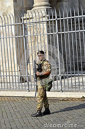 Anti-terrorism soldier on patrol in Rome tourist sites Editorial Stock Photo