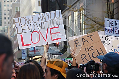 Anti trump signs and people at march in 2017 Editorial Stock Photo