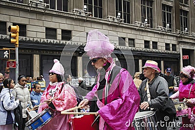 Anti-war `Code Pink` demonstrators taking part in the Easter Parade on 5th avenue in New York City Editorial Stock Photo