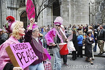 Anti-war `Code Pink` demonstrators taking part in the Easter Parade on 5th avenue in New York City Editorial Stock Photo