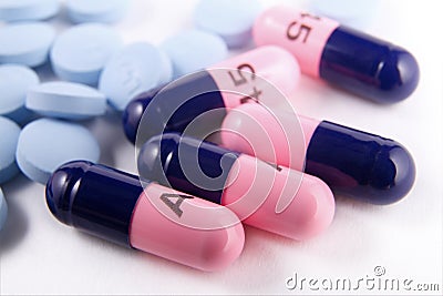 Antibiotic capsules and pain reliever pills Stock Photo