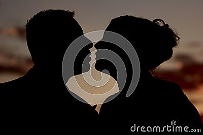 The Anticipated Kiss At Sunset Stock Photo