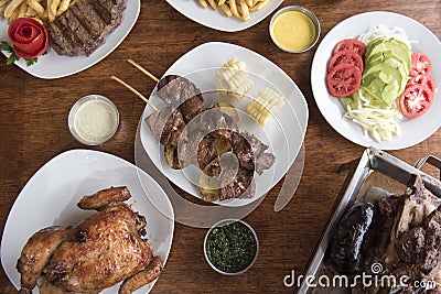 Anticuchos, Peruvian cuisine, grilled skewered beef heart meat with boiled potato and white corn Stock Photo