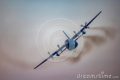 Antidotum Airshow Leszno 2023 and acrobatic shows full of smoke of C-130 Hercules plane on a cloudy Editorial Stock Photo