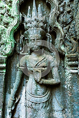 Antient reliefs of dancer, Ta Prohm Temple in Angkor Wat complex, Cambodia Stock Photo