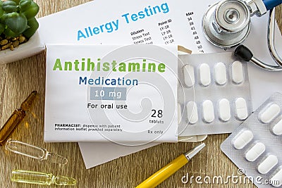 Antihistamine medication or allergy drug concept photo. On doctor table is pack with word `Antihistamine medication` and pills for Editorial Stock Photo