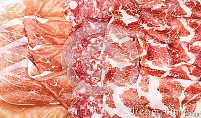 Antipasti composition of italian cured meat types. Stock Photo