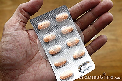 Pack of popular brand of paracetamol medicine on the hand of a person Editorial Stock Photo