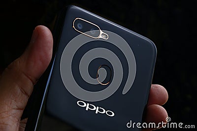 Dual lens camera and fingerprint scanner at the back of a smartphone from a popular smartphone brand Editorial Stock Photo