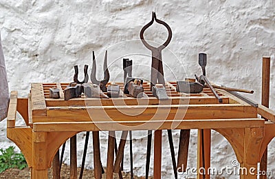 The antique blacksmith`s tools Stock Photo