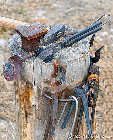 The antique blacksmith`s tools Stock Photo