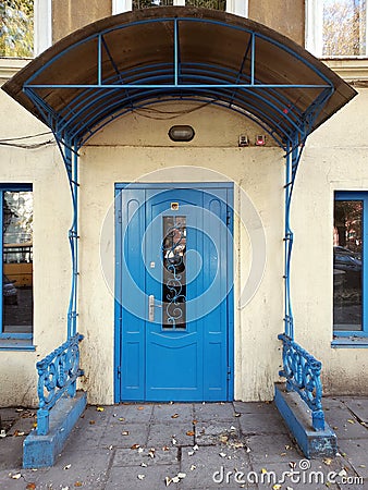 Antique blue door at retro porch of old building Editorial Stock Photo