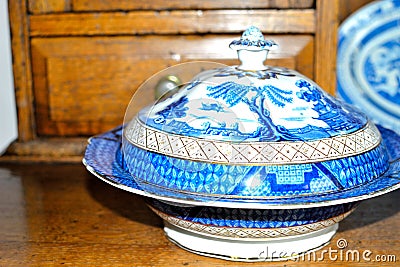 antique blue and white willow pattern china Stock Photo