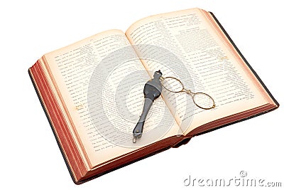 Antique book with lorgnette Stock Photo