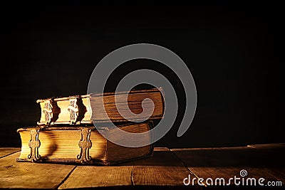 antique books, with brass clasps. fantasy medieval period and religious concept Stock Photo