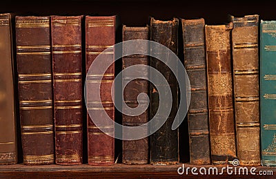 Antique books on shelf Stock Photo