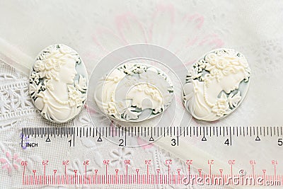 Antique cameo with ladies face, cameo brooch representing the side portrait of a woman Stock Photo