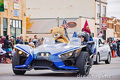 Antique car driving in Cowboy Christmas Parade Editorial Stock Photo