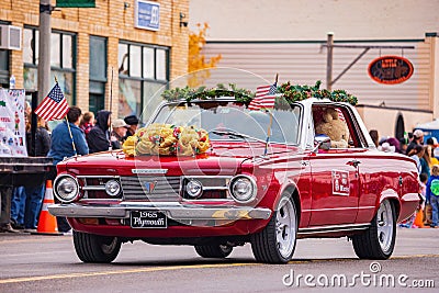 Antique car driving in Cowboy Christmas Parade Editorial Stock Photo