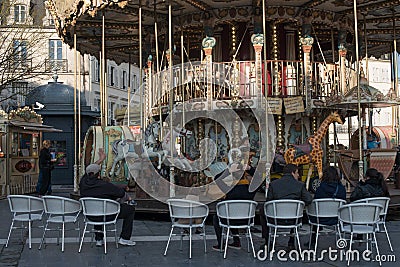 Antique Carousel on the main square of Fontainebleau Editorial Stock Photo